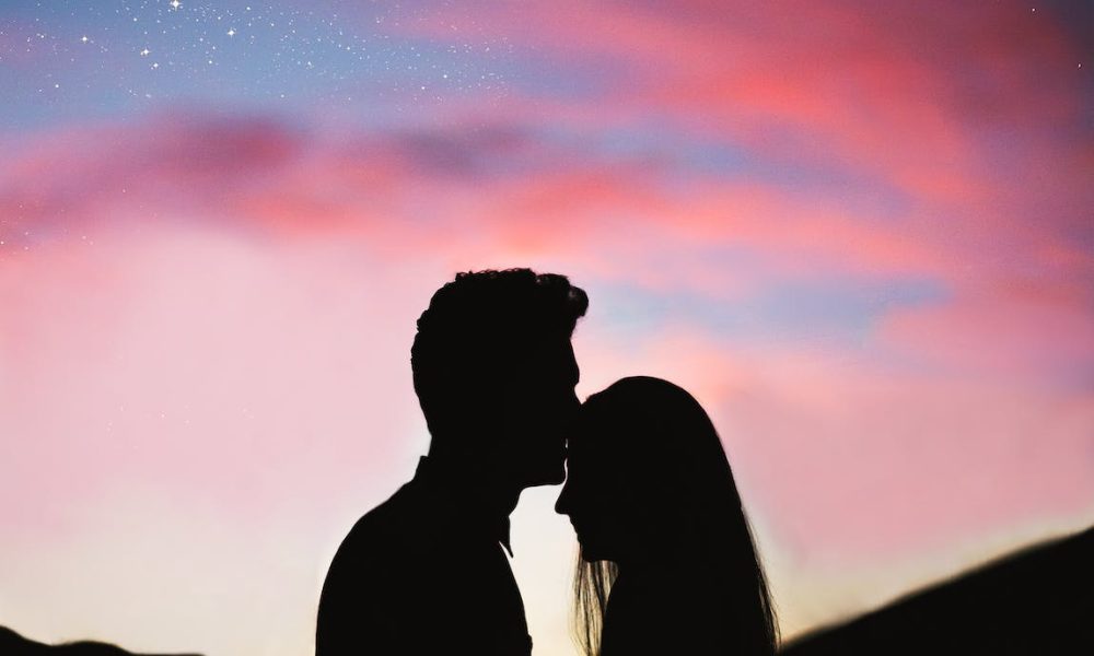 silhouette photography of man and woman