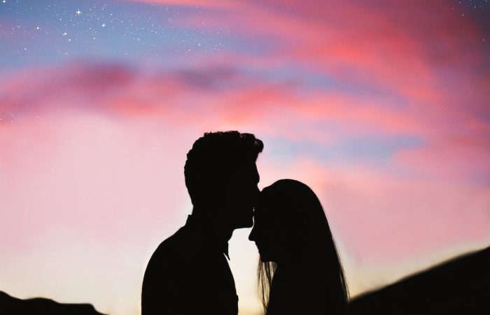 silhouette photography of man and woman